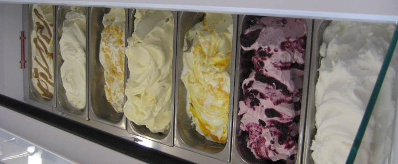 7 napolis of home made ice cream in the cabinet at Rays Ice Cream, Swindon
