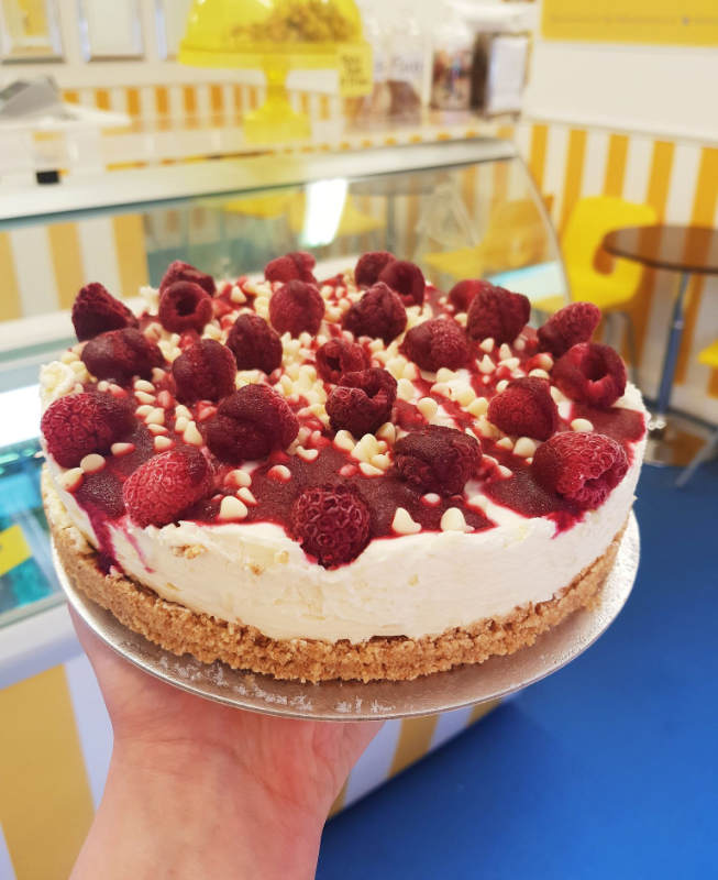 Home made whole raspberry and white chocolate cheesecake from Rays Ice Cream, Swindon
